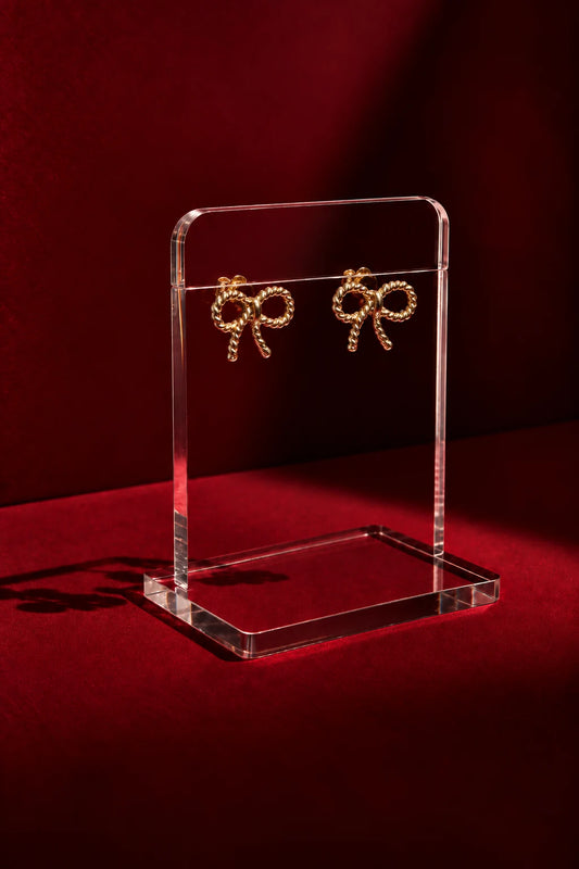 Twisted Bow Stud Earrings in Gold & Silver Pakistan